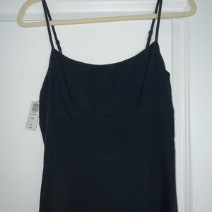 Black short aritzia Sunday best dress. Still has tags. Very flattering.